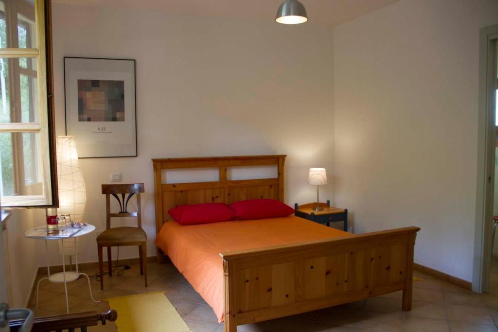 Postel nebo postele na pokoji v ubytování Casa Calendula