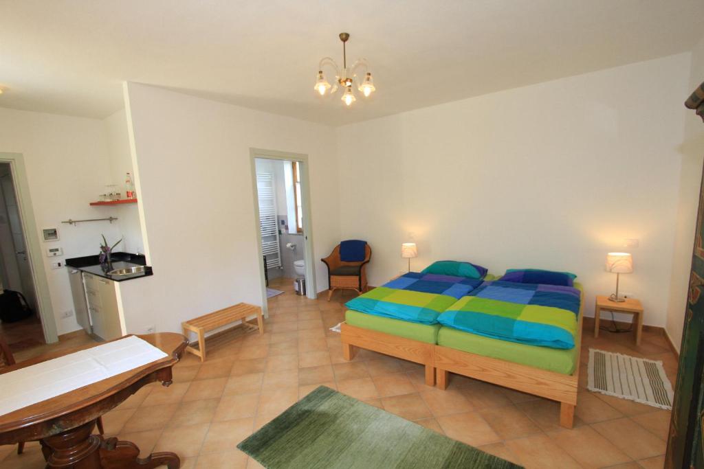 Postel nebo postele na pokoji v ubytování Casa Calendula