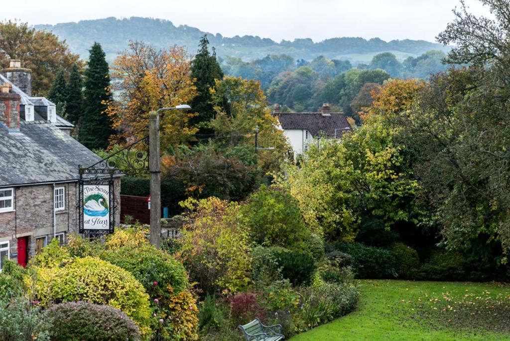 a view of a small village with trees and bushes at The Swan At Hay in Hay-on-Wye