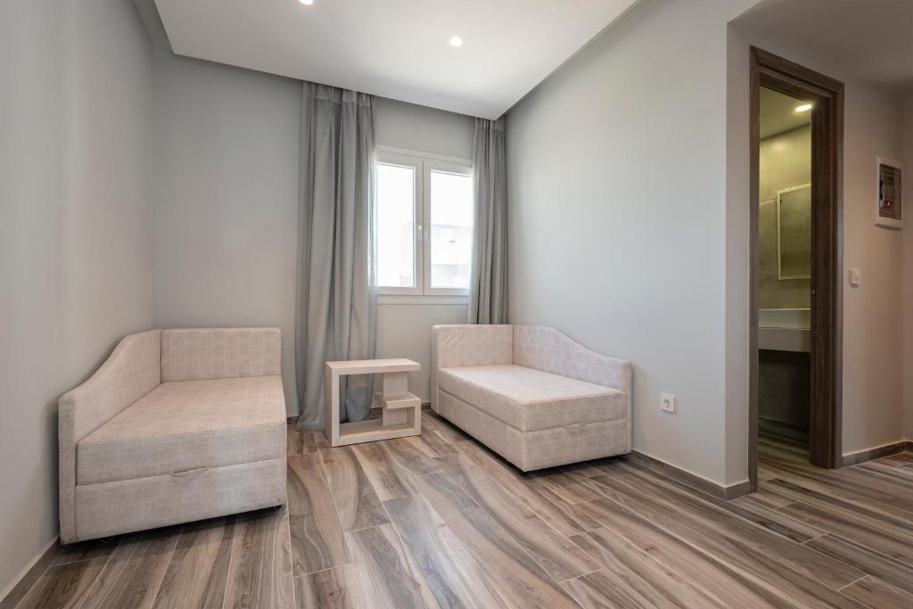 Posezení v ubytování Kyma Rooms & Suites