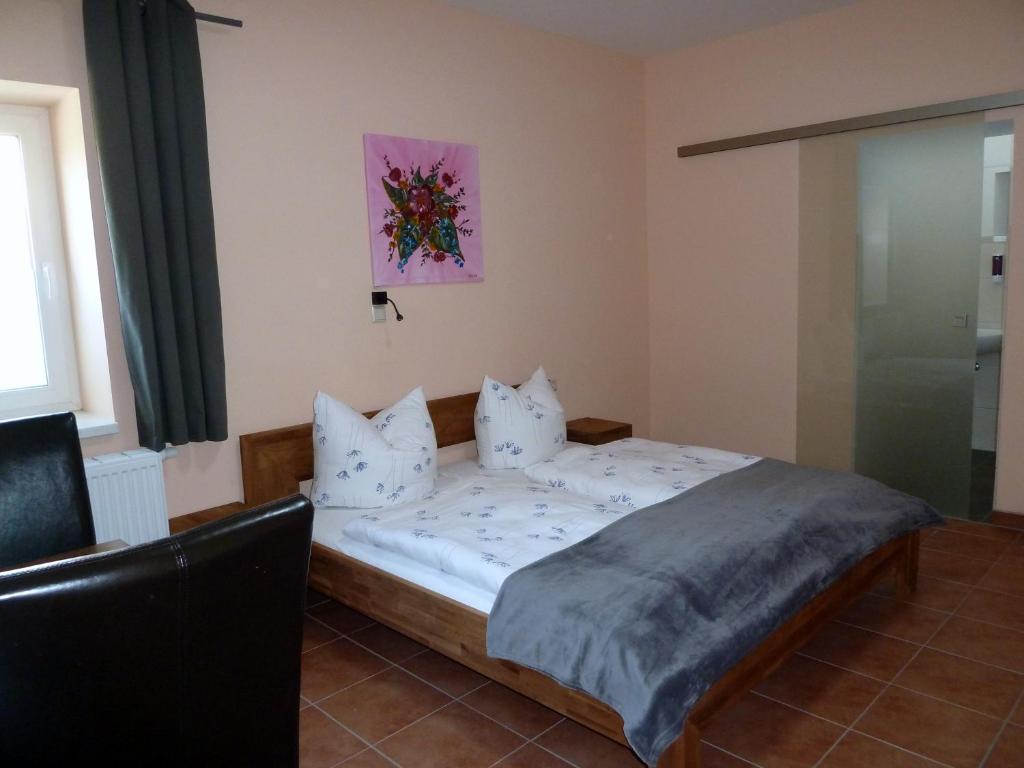 Postel nebo postele na pokoji v ubytování Hotel Wittenberg-Hotel Garni