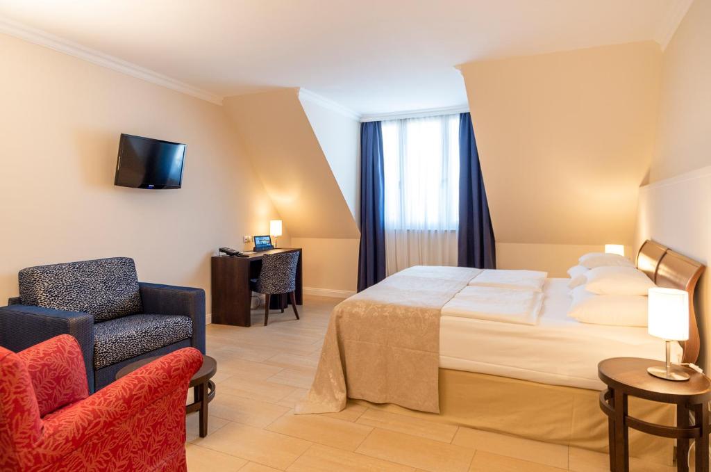 Postel nebo postele na pokoji v ubytování Hotel Spiess & Spiess