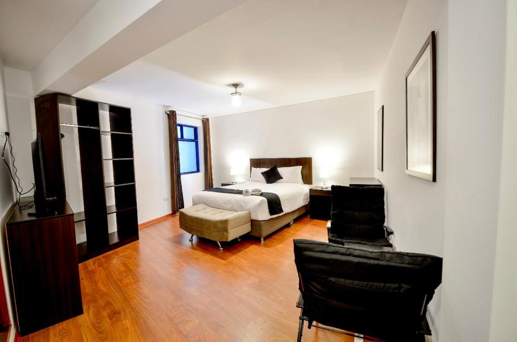 Postel nebo postele na pokoji v ubytování Ankawa Hotel Boutique