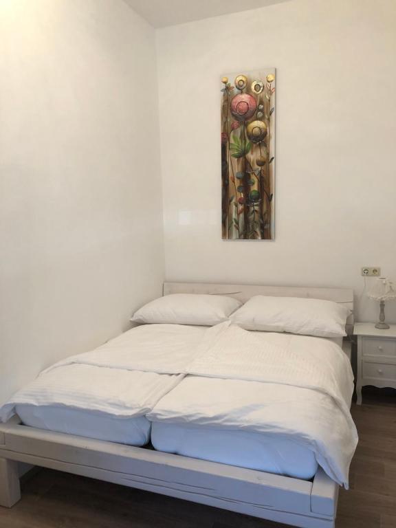 Postel nebo postele na pokoji v ubytování Konditorei Mandl