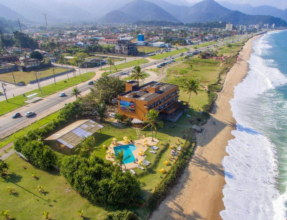 an aerial view of a beach and the ocean at Brisa Hotel in Caraguatatuba