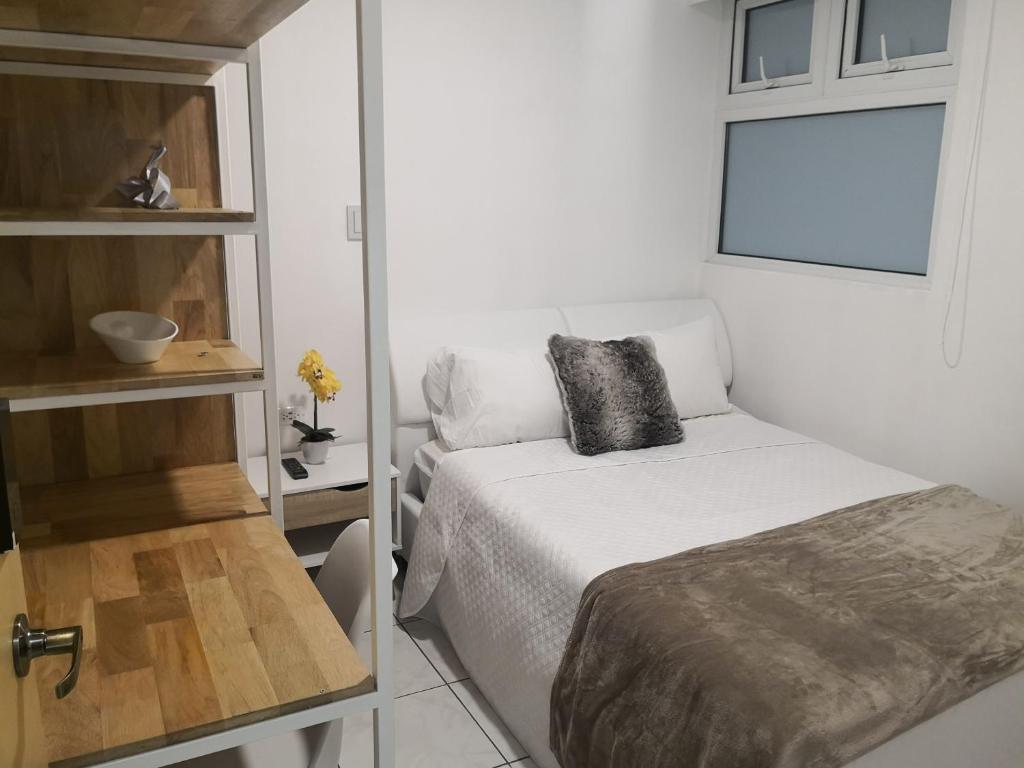 Postel nebo postele na pokoji v ubytování Apartments and Rooms Distecon