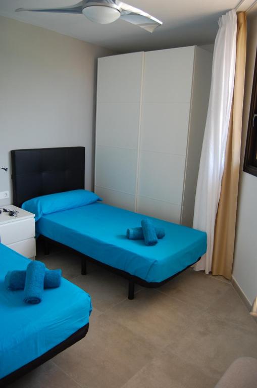 Posteľ alebo postele v izbe v ubytovaní Paradise Court Las Americas WiFi Pool 57