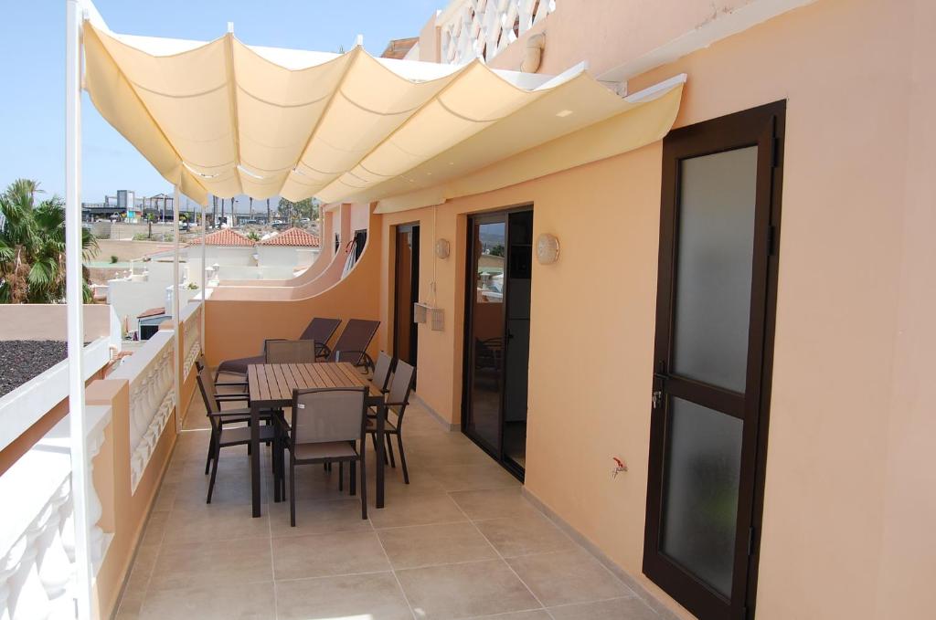 Balkón alebo terasa v ubytovaní Paradise Court Las Americas WiFi Pool 57