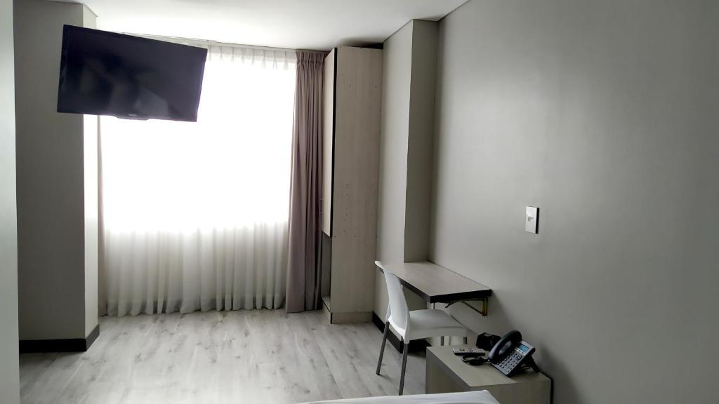 TV a/nebo společenská místnost v ubytování Hotel WLH Silver Corferias