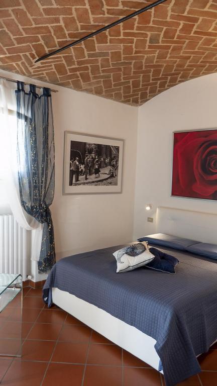 Postel nebo postele na pokoji v ubytování Villa Matildis