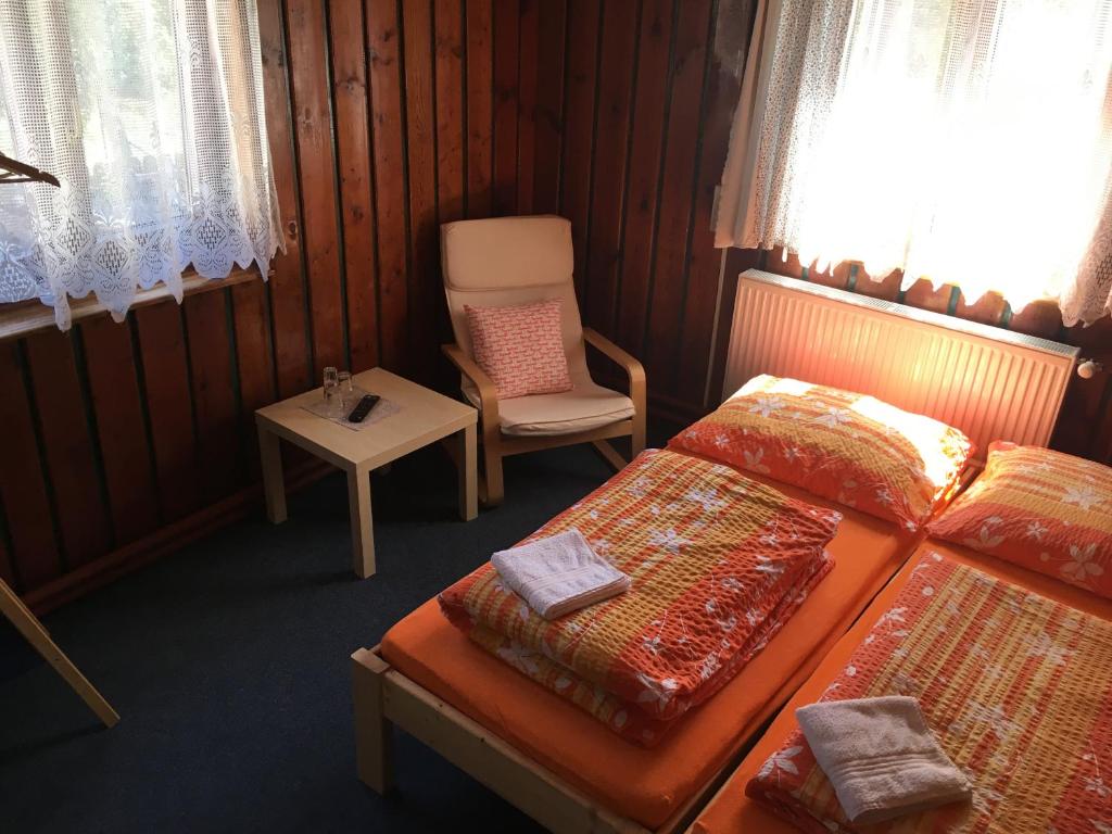 Postel nebo postele na pokoji v ubytování Penzion REHEK