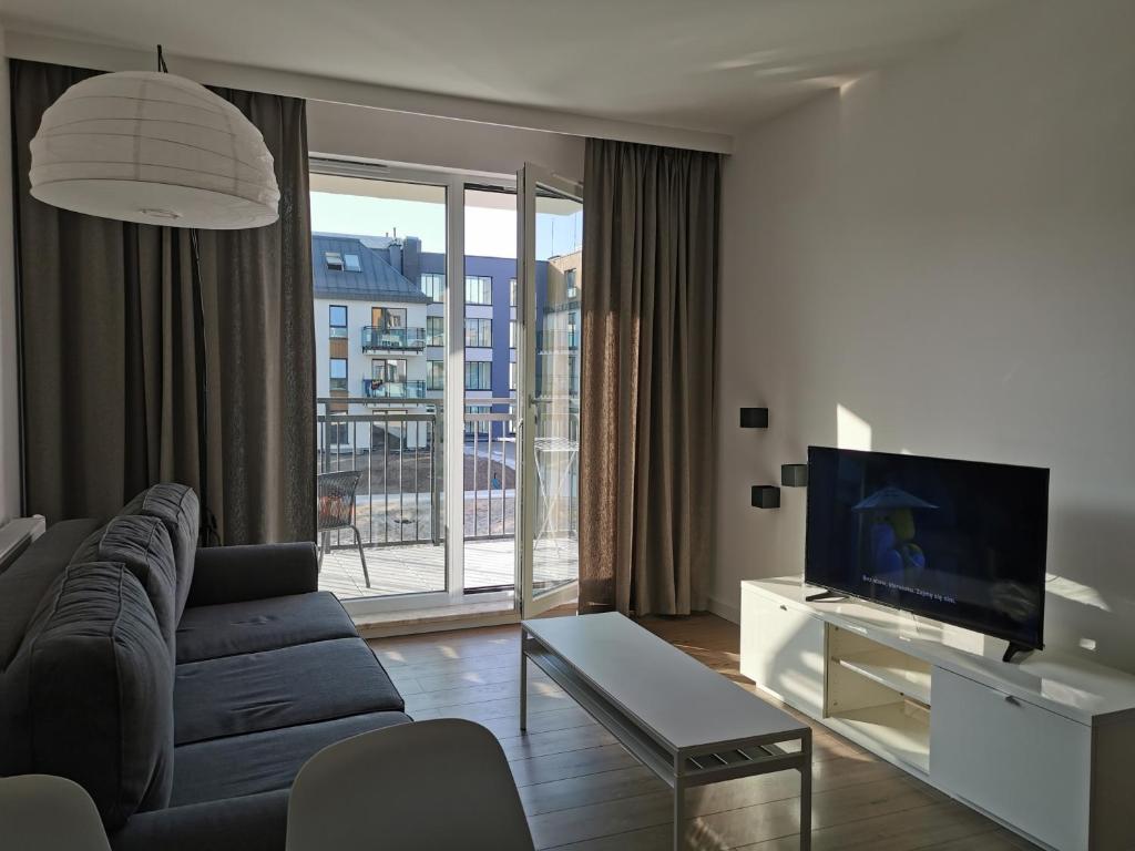 Et tv og/eller underholdning på Apartament Bel Mare Pelikan