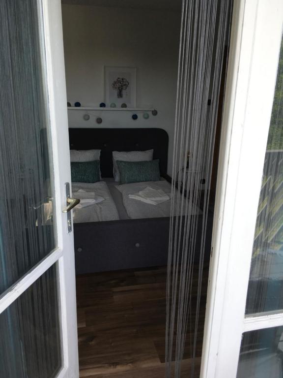 Postel nebo postele na pokoji v ubytování Babérsom apartman