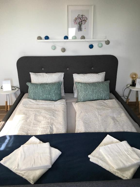 Postel nebo postele na pokoji v ubytování Babérsom apartman