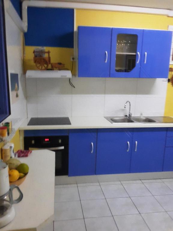 Kuchyň nebo kuchyňský kout v ubytování Maison mitoyenne