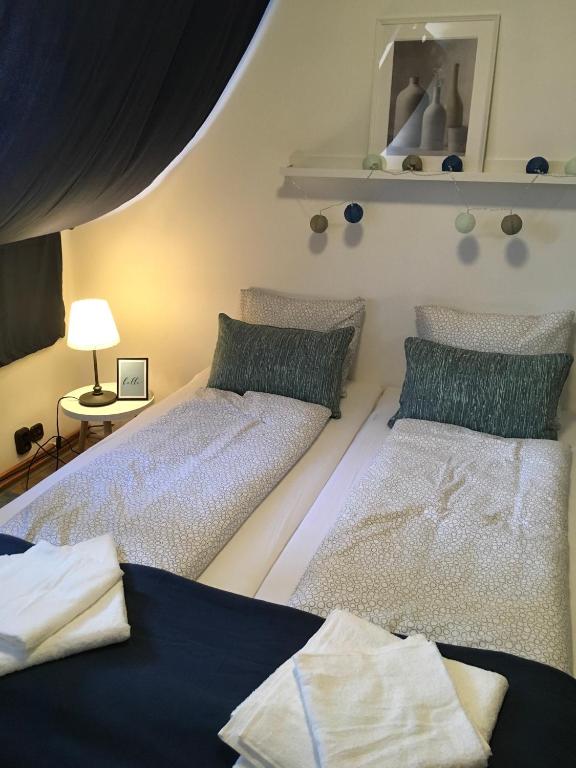 Postel nebo postele na pokoji v ubytování Babérsom apartman
