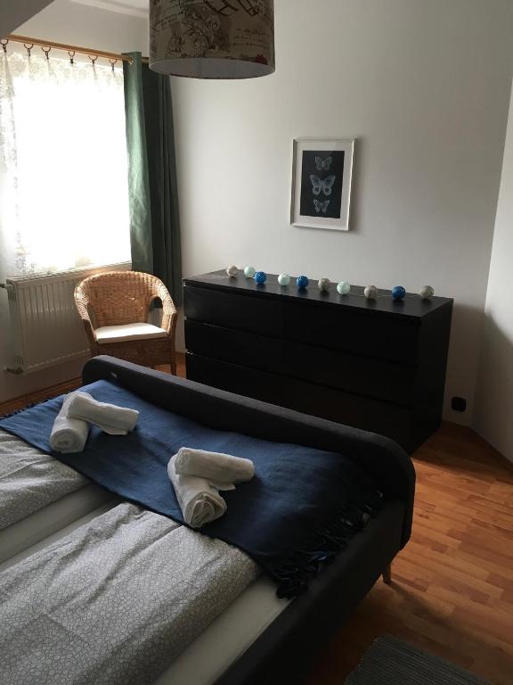 Postel nebo postele na pokoji v ubytování Babérsom apartman