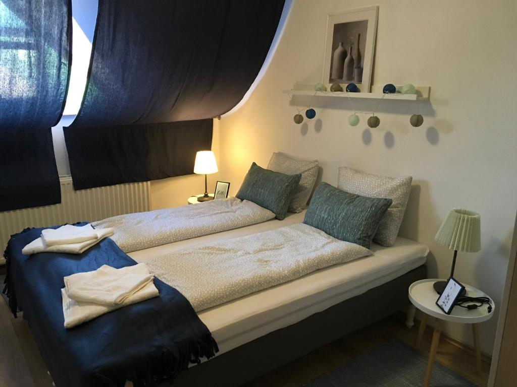 Postel nebo postele na pokoji v ubytování Babérsom apartman