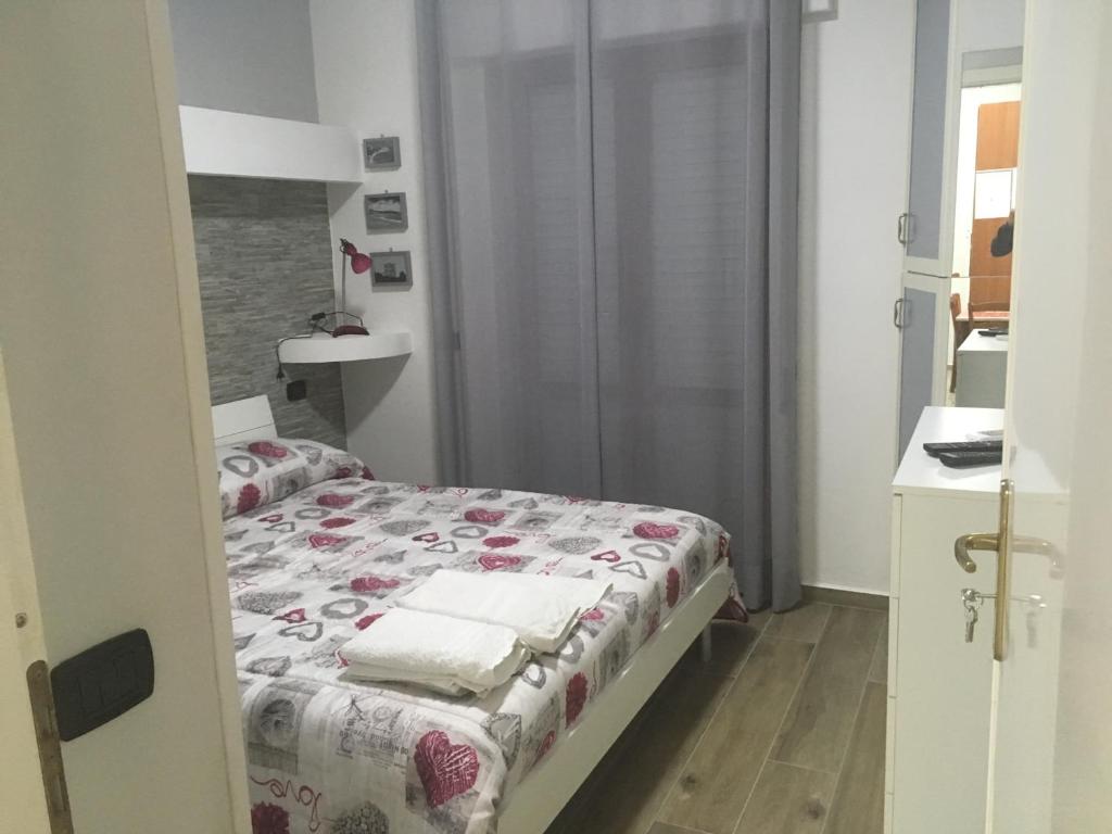 Postel nebo postele na pokoji v ubytování Re Mare B&B