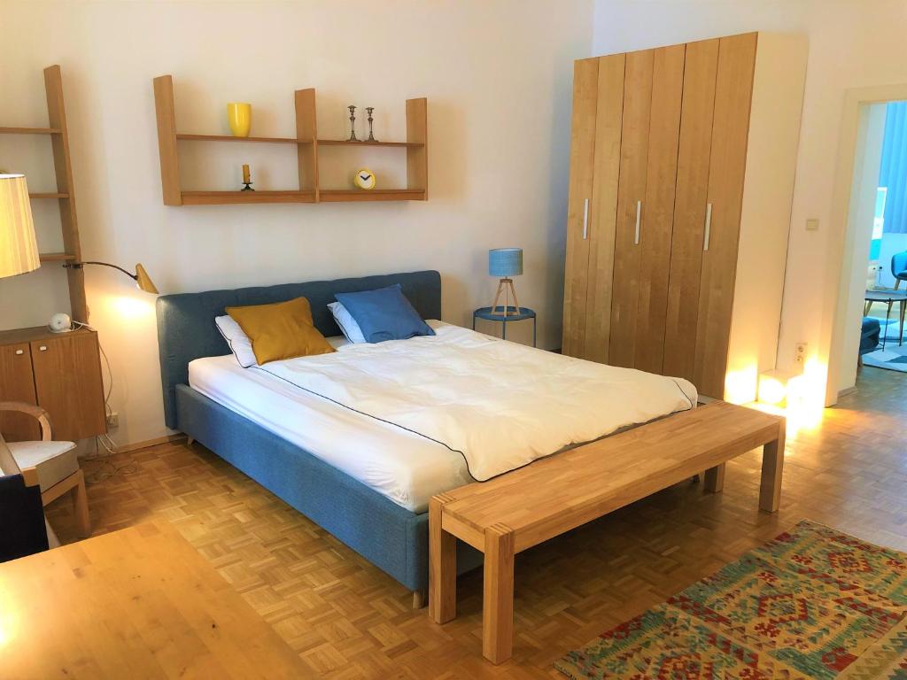 Postel nebo postele na pokoji v ubytování Vintage Design Apartment