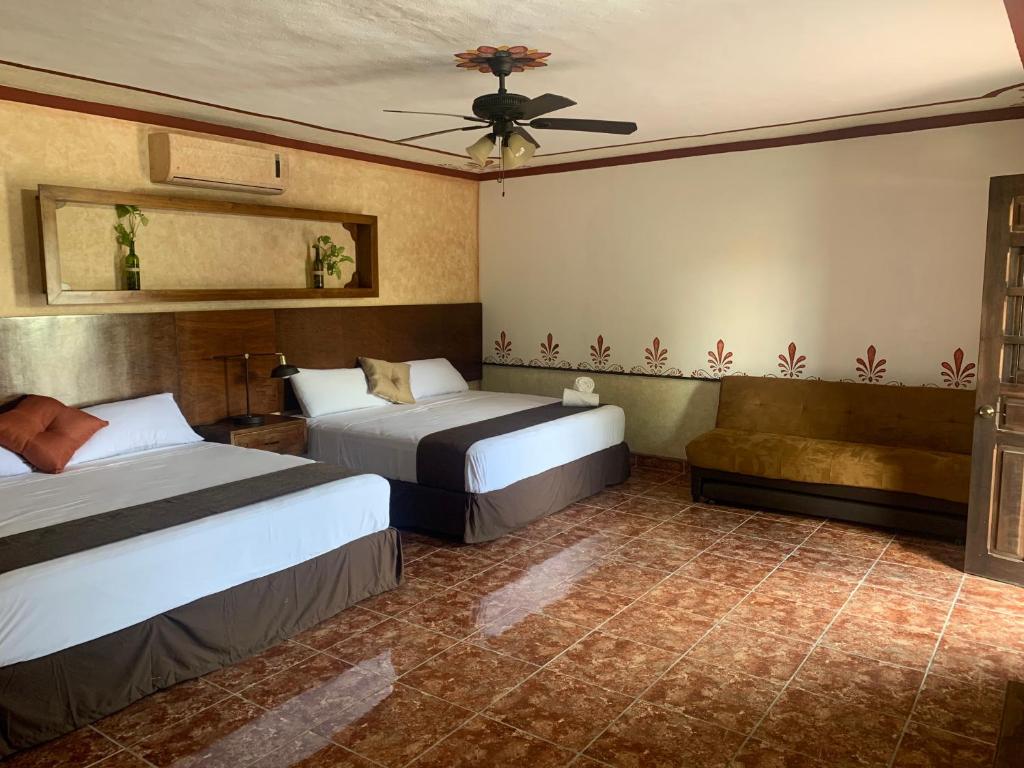 Postel nebo postele na pokoji v ubytování Hotel Tuul