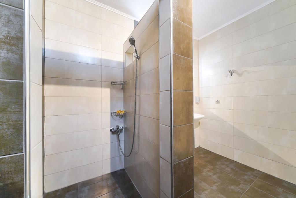 Koupelna v ubytování Eridon Suites
