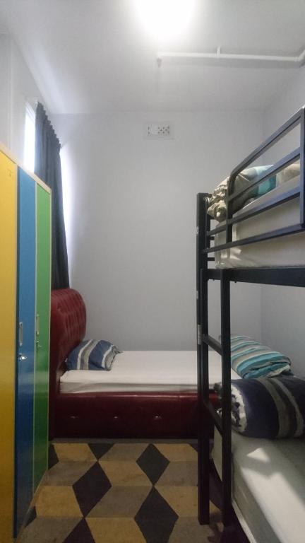 Postel nebo postele na pokoji v ubytování Backpackers Imperial Hotel