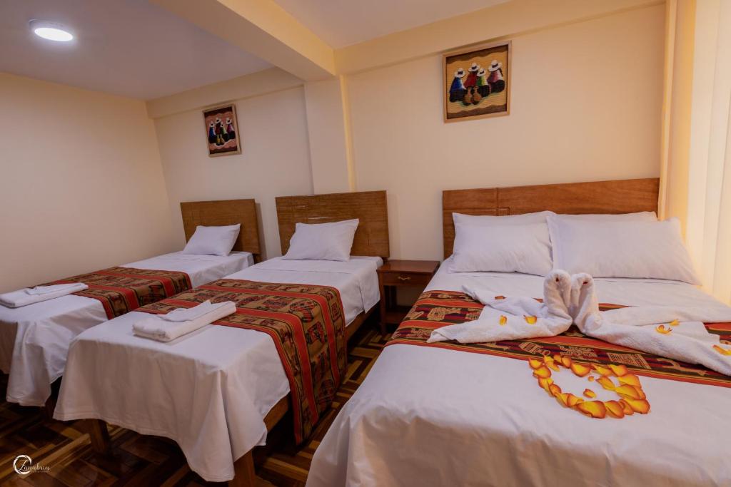 Postel nebo postele na pokoji v ubytování Quechua Hostal Recoleta