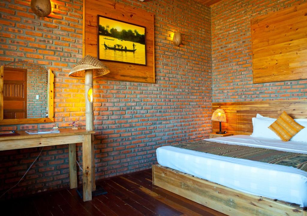 Postel nebo postele na pokoji v ubytování Wild Beach Boutique Resort