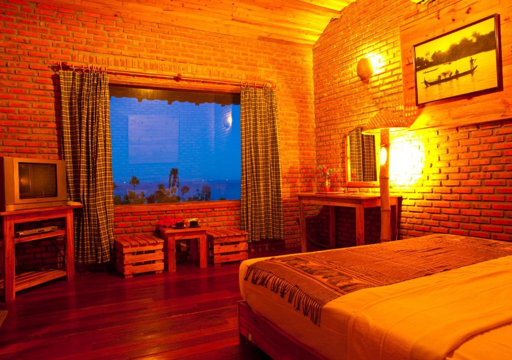 Postel nebo postele na pokoji v ubytování Wild Beach Boutique Resort