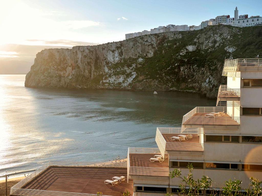 a view of the ocean from a building at Mercure Quemado Al-Hoceima Resort in Al Hoceïma