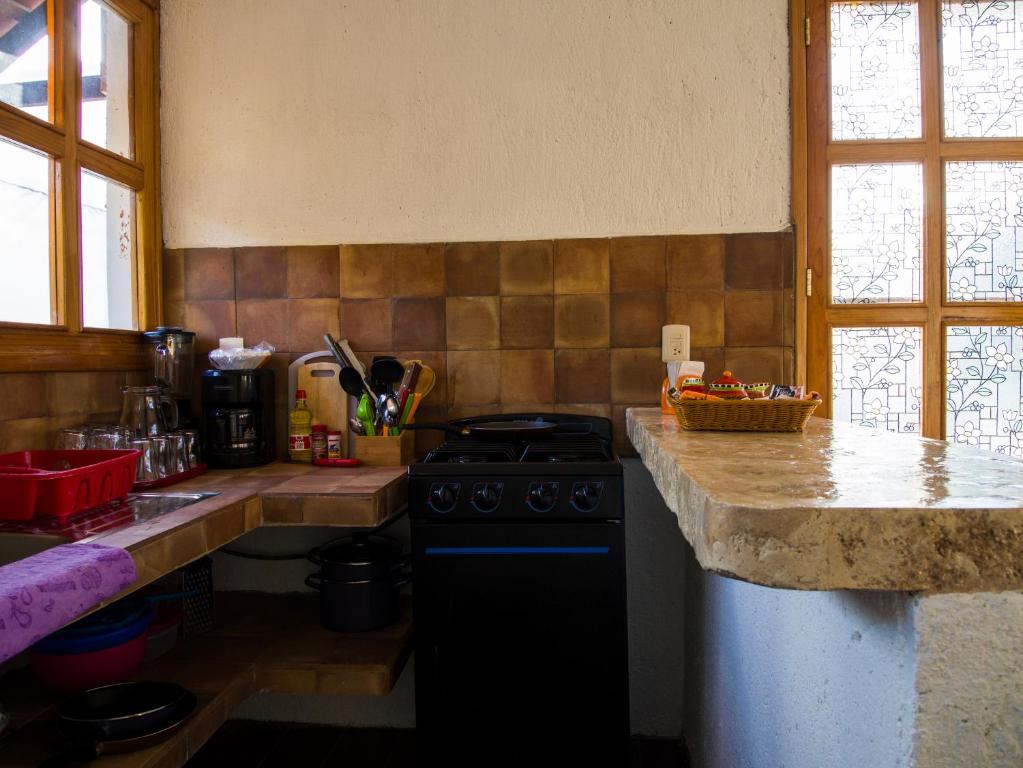 Kuchyň nebo kuchyňský kout v ubytování Aldea Isla Sagrada