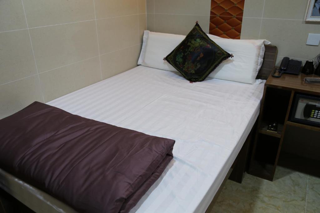 Postel nebo postele na pokoji v ubytování Australian Guest House