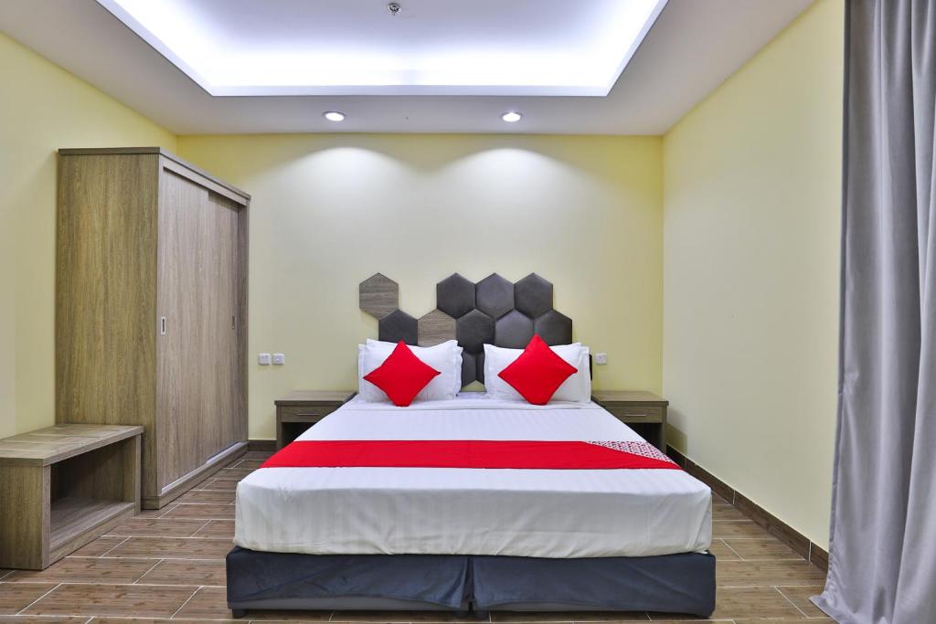 Postel nebo postele na pokoji v ubytování Shahad Alola Serviced apartments