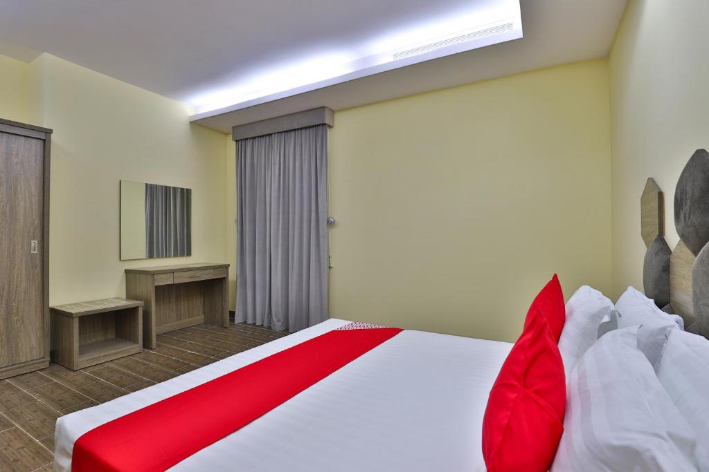 Postel nebo postele na pokoji v ubytování Shahad Alola Serviced apartments