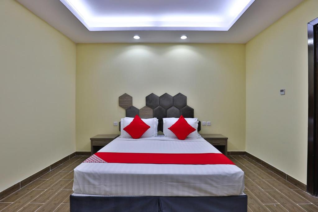 Postel nebo postele na pokoji v ubytování Shahad Alola Serviced apartments