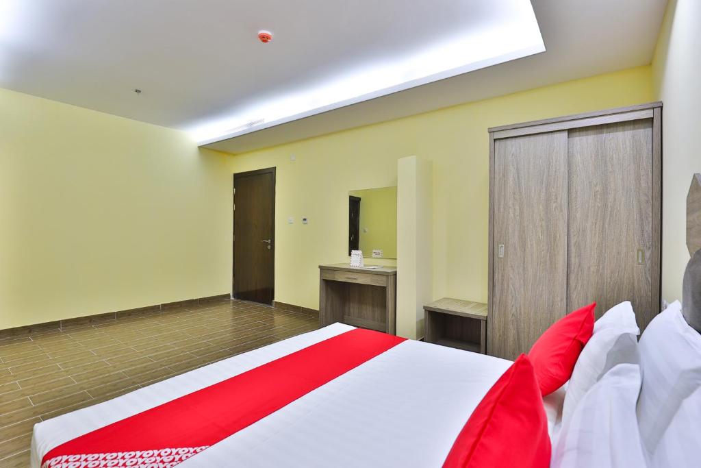Postel nebo postele na pokoji v ubytování Shahad Alola Serviced apartments