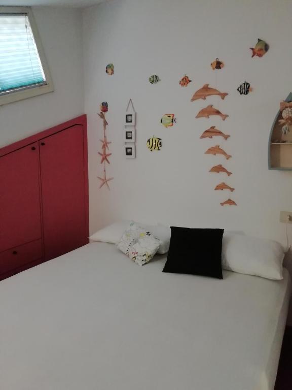 A bed or beds in a room at sole mare versilia