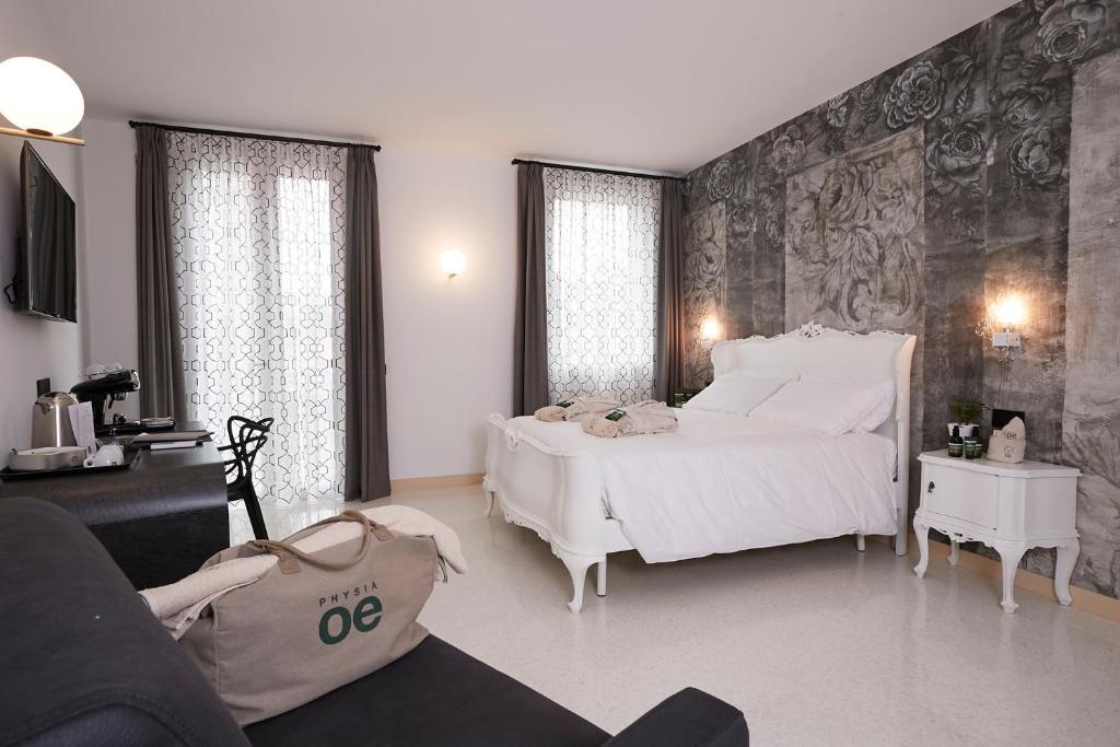 Posteľ alebo postele v izbe v ubytovaní Antica Pusterla Relais de Charme
