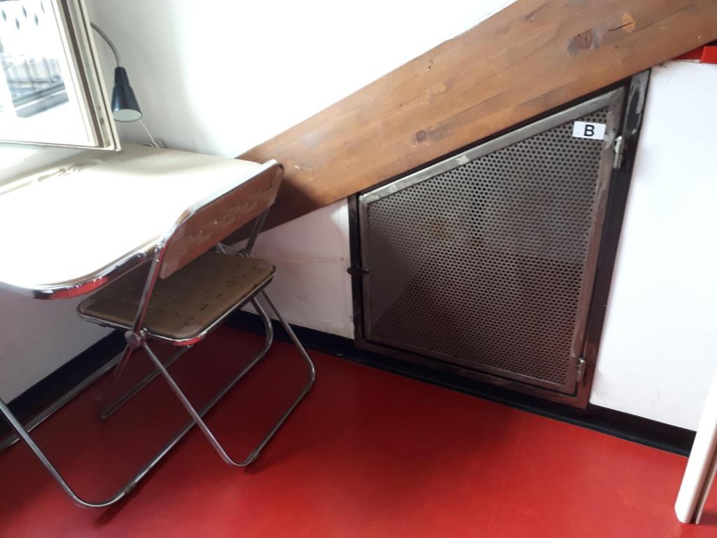 Kuchyňa alebo kuchynka v ubytovaní Attic Hostel Torino