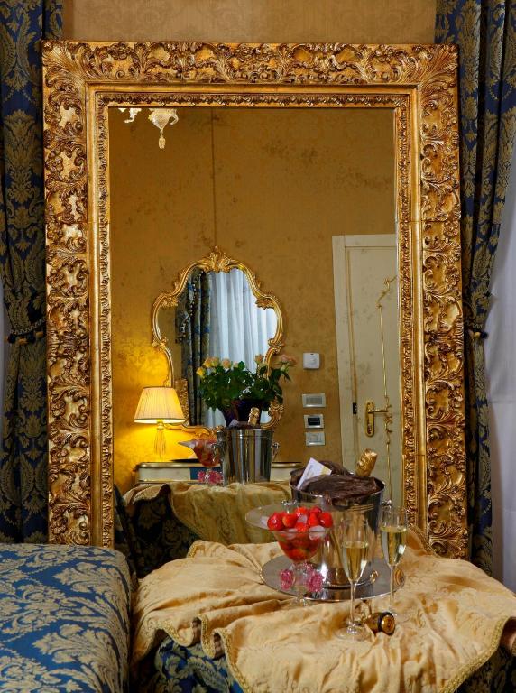 Postel nebo postele na pokoji v ubytování Hotel Becher
