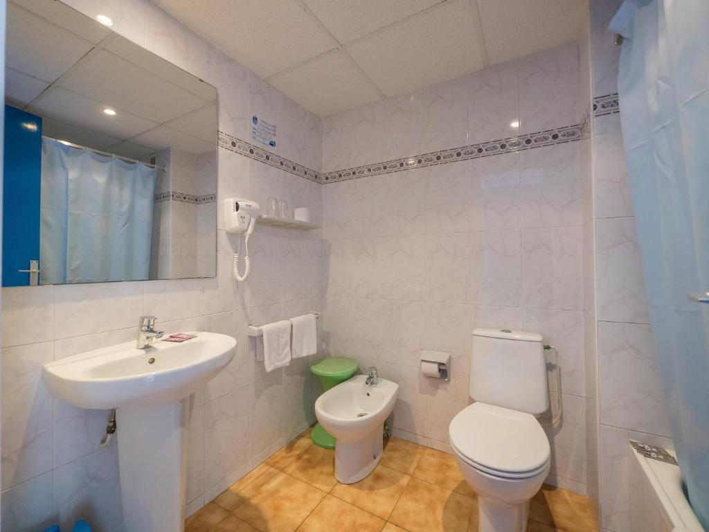 Koupelna v ubytování Checkin Garbí