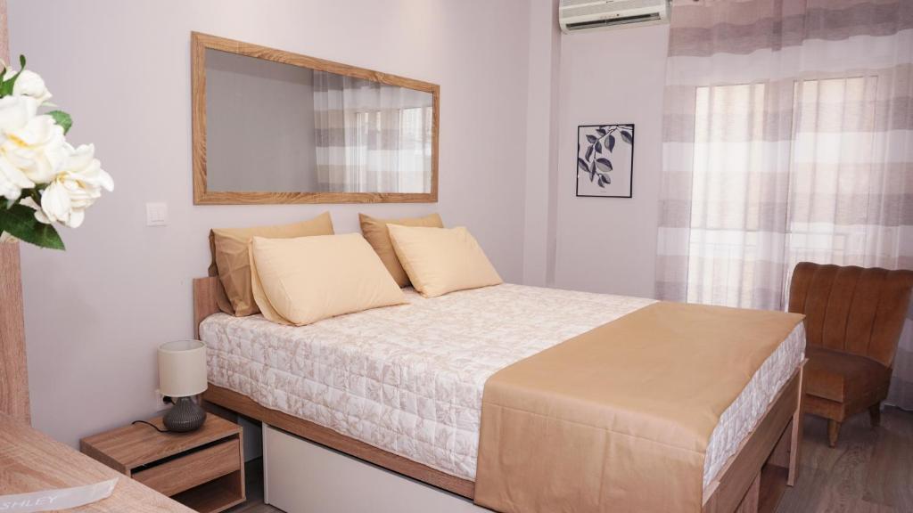 Posteľ alebo postele v izbe v ubytovaní Cozy home in Thessaloniki center