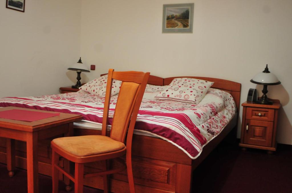Postel nebo postele na pokoji v ubytování Hotel Pegas Brno