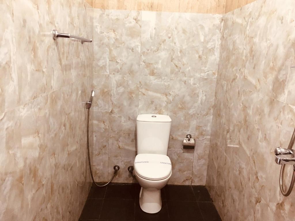 Koupelna v ubytování Sarvodaya Samma Vaasa Residence