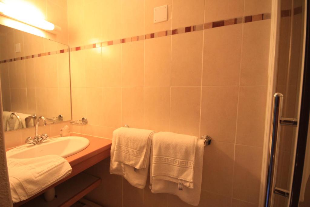 Postel nebo postele na pokoji v ubytování Hôtel "U Nebbiu"