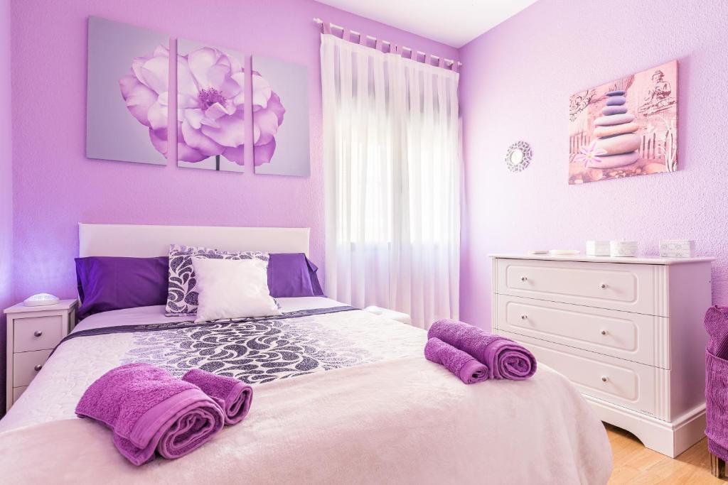 Posteľ alebo postele v izbe v ubytovaní APARTAMENTOS TURISTICOS TURISToledo