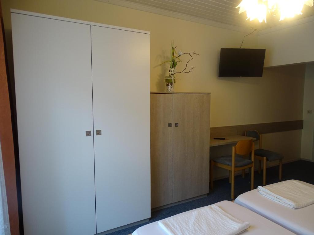 Postel nebo postele na pokoji v ubytování Gasthof Torwirt