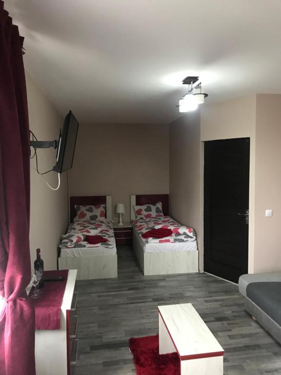 Postel nebo postele na pokoji v ubytování Wellion