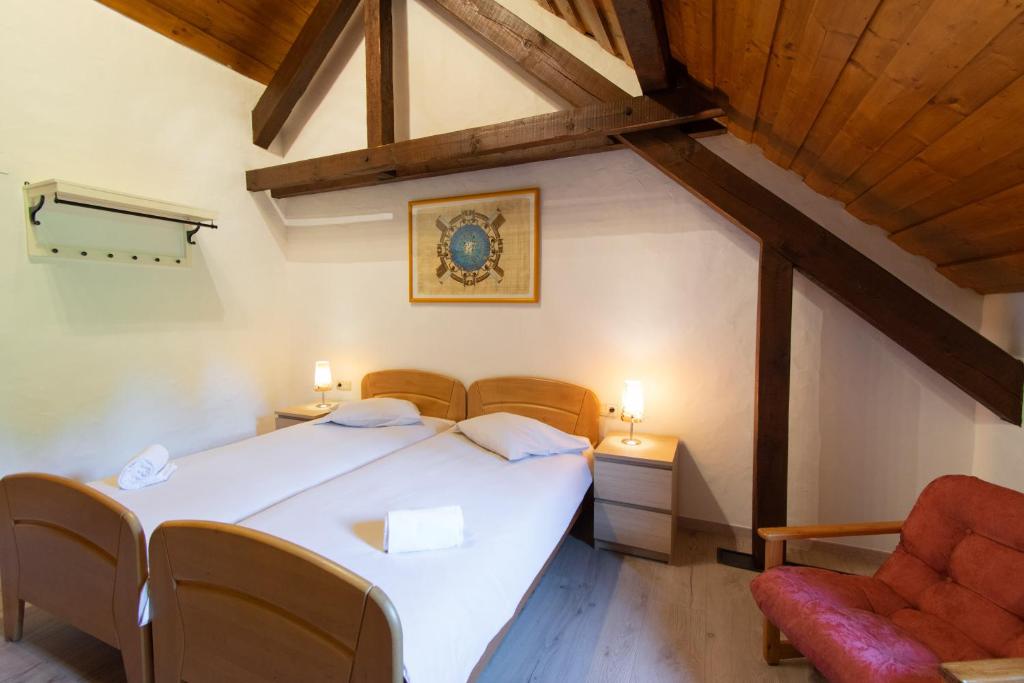Postel nebo postele na pokoji v ubytování Domaine du Moulin d'Asselborn